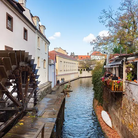 Charming Riverside By Charles Bridge Prága
